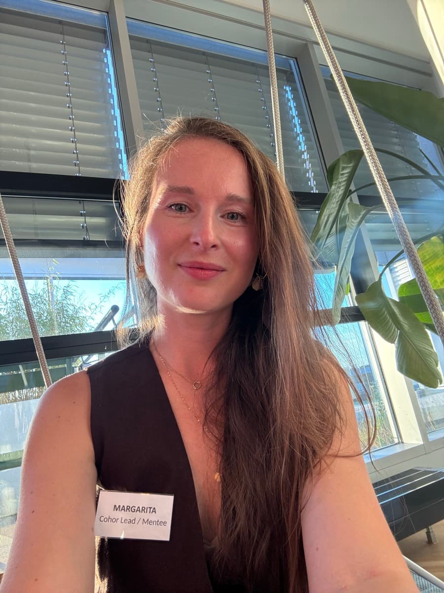 Margarita Dautova wearing a Cohort Lead / Mentee name badge at a Thrive with Mentoring event